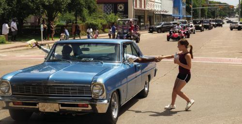 Children stocked up on candy and treats during the La Grange Juneteenth Parade on Saturday. Photos by Andy Behlen