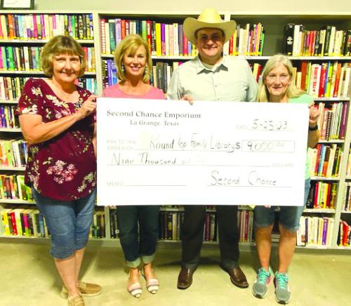 Second Chance Makes Donation to Library
