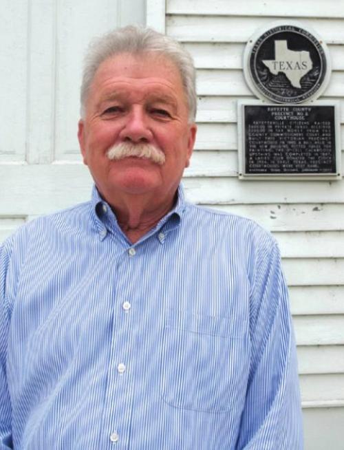 Fred Roberts, photographed on the Fayetteville town square near his office, is running for State House District 85. Photo by Andy Behlen