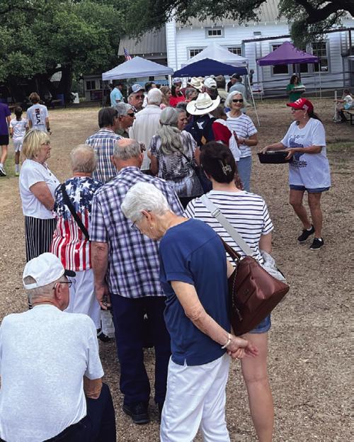 Unlike some church picnics, Dubina doesn’t have a drive-thru line, but they do bring free sweet tea to folks waiting in line.