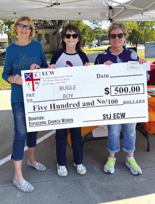 St. James’ Episcopal ECW donated $500 to the Bugle Boy. Pictured from left: Lil Landry, Heather Albright, Bugle Boy Director, and Jane Malik.