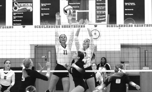 Meredith Magliolo (11) and Mackenzie Kunschick (17) of the Schulenburg volleyball team get above the net in last Friday’s victory over Round Top-Carmine. Photo by Audrey Kristynik