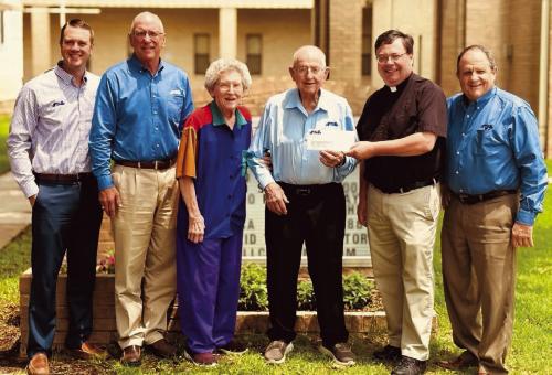 Fayette Savings Bank recently donated $5,000 to Martin Luther Lutheran Church in Carmine in honor of Jerry Jacob for his 46 years of service on the FSB board of directors. Pictured (from left) are Wade Mozisek, FSB President; David Zapalac, FSB CEO; Barbara Jacob, Jerry Jacob, Pastor David Tinker, Rodney Kalich, FSB Executive VP CFO.
