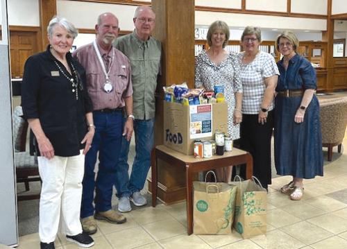 The Round Top Lions Club and Round Top Family Library Junior Master Gardeners recently sponsored a food drive. Pictured from left are Karen Duddlesten, Gary Pior, Gary Russell, Pam Langford, Susan Weyand, and Terri Russell.