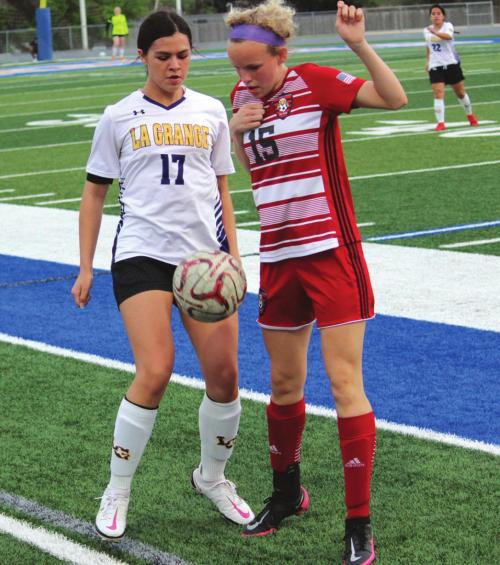 La Grange’s Jolie Gutierrez and a Salado player battle for the ball while trying to keep it from going out of bounds Tuesday. Photo by Jeff Wick
