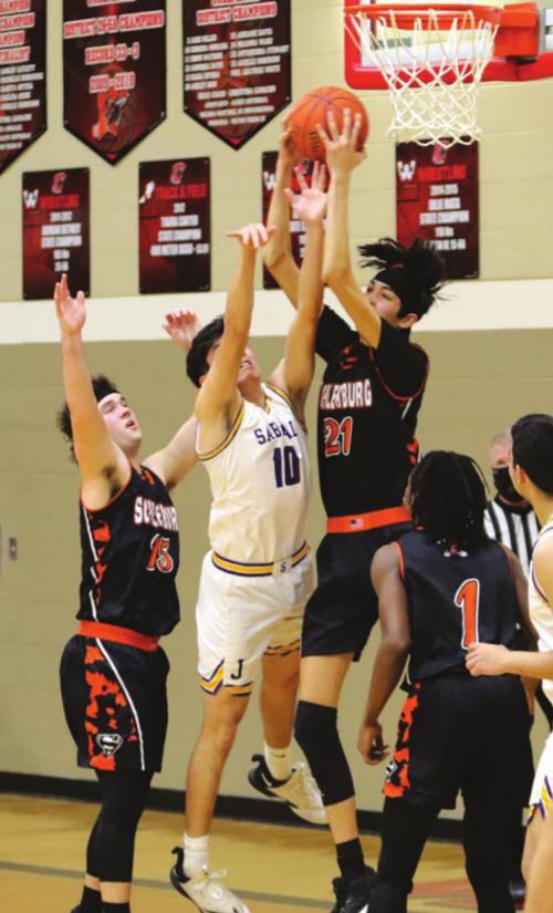 Schulenburg’s Alex Lozano grabs a rebound in Tuesday’s game. Photo by Audrey Kristynik