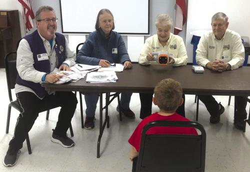 The Lions Clubs of Weimar concluded the 2023 fall campaign of Kids Sight vision screening at St. Rose of Lima Elementary School in Schulenburg. Using the non-invasive Plusoptix vision screener, early detection of eye abnormalities are possible. Catching these problems early can lead to improved vision and educational success of our area youth. Pictured from left are Mark Dannemiller, Sue Mullens, Mariette Bellamy and Allen Bellamy.