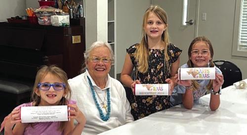 Sally Reynolds, Round Top author and arts enthusiast, will be recognized Thursday as the Runway 159 Style Icon. This group picture features from left to right: Lincoln Moreau, Sally Reynolds, Maddison Moreau, and Scout Farley.
