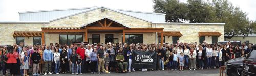 Group picture taken after the ribbon cutting at the church.