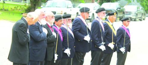 The members of the 4th Degree Knights of Columbus stood guard during the outside portion of Monday’s event.