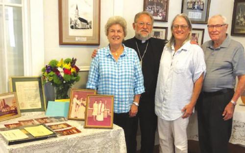 Pictured with Pastor Herb Beyer at the celebration are family members wife Lisa Beyer, father-in-law Homer Breland, and sister-inlaw Lynn Breland.
