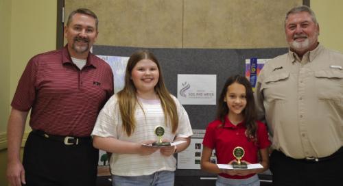 Poster Contest Winners (Division 2 - Grade 3-6) presented by Mark Friedrich-Fayette Saving Bank and Scott McManus-National Bank &amp; Trust: Sophie Janda-Sacred Heart School and Emma Mc-Court-St. Rose of Lima School.