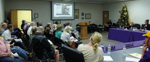 Aaron Smith, Vice President of Development for Monarch Energy, appeared on screen via teleconference at the La Grange I.S.D. School Board meeting Monday night to answer questions about his company’s proposed hydrogen fuel generation plant. Monarch is seeking tax incentives from the school district. More than a dozen citizens spoke against the tax incentives at the meeting. Photo by Andy Behlen