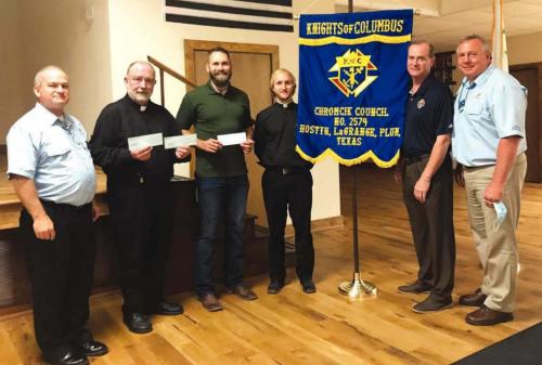 KC Council No. 2574 Presents Checks
