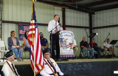 County Judge Dan Mueller delivers a speech at the Flag Day celebration on Sunday.