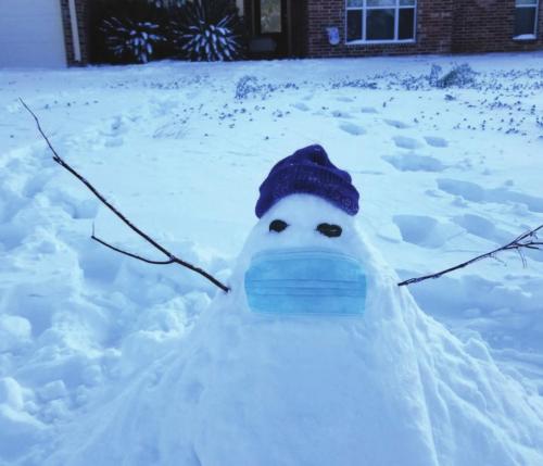 Donna Janda shared this photo of a snowman from last week wearing a COVID mask.