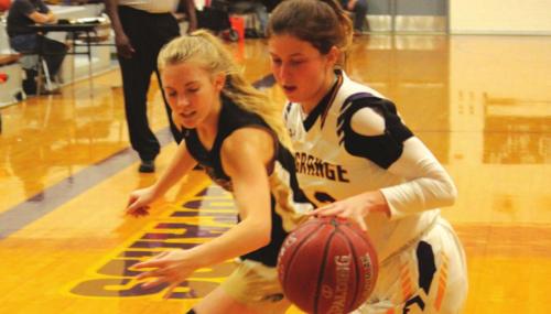 La Grange’s Katelynn Allen, shown above against the defense of Giddings’ Sadie Claxton, made a game-tying jumper with 20 seconds left in Tuesday’s game but Giddings rallied for a 45-43 win. Photo by Jeff Wick