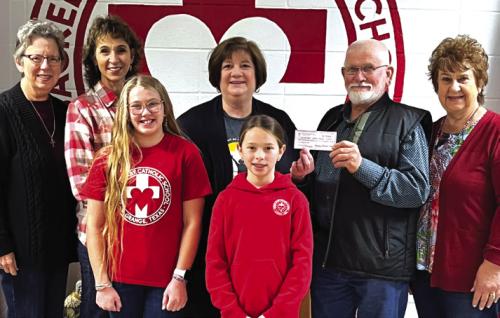 Hostyn KJT Donates to Sacred Heart