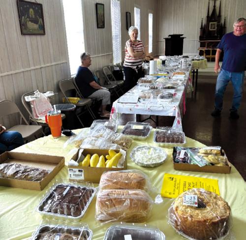 Pictured here at the St. John church bake sale are Maxine Brugger, Gladys Koehl and Robert Kasmiersky.