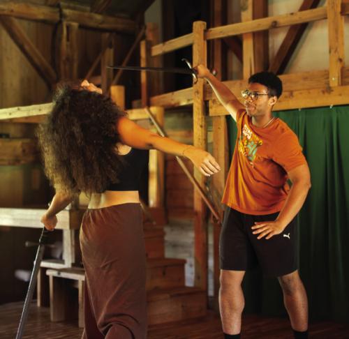 UT students rehearsing earlier this month in the iconic Winedale Theater barn, above, and below under the ancient pecan trees outside the barn. Photos by Meadow Taylor-Marklin