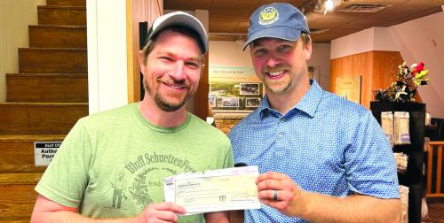 Recently the Bluff Schuetzen Fest raised funds in support of Friends of Kreische Brewery &amp; Monument Hill Historic Sites. Rutersville Hermann Sons Life contributed $500 towards the event. This contribution was duplicated with a $500 matching funds check from the Hermann Sons Life home office in San Antonio. Hermann Sons Life agent Kyle Hartmann is shown presenting the check to Gavin Miculka, Assistant Site Manager for Monument Hill State Park.