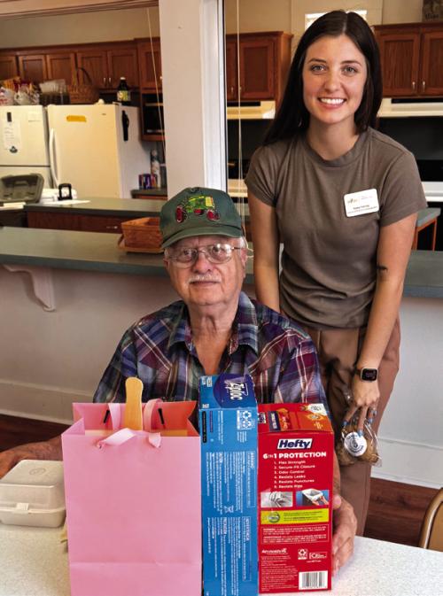 August Kalinec has quite the winning streak at bingo. Here he is with Kayley Yancey from Flatonia Heathcare Center, who called the blackout game he won.