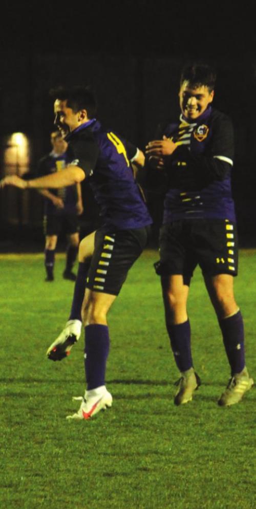 La Grange’s Jackson Bundick, left, celebrates after scoring his goal Tuesday.