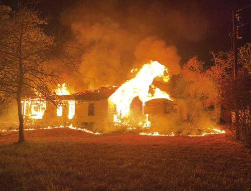 Woman Saved from House Fire