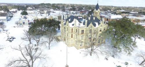 The courthouse square covered in snow after February’s winter storm.