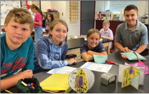 FISD Jr. high students working on plant and cell projects. Pictured from left: Cullen Hunger, Baylee Stout, Raylee Denham and Tyler Kolenovsky.