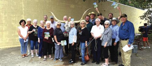 The Fayette County Record held its 103rd anniversary party Friday in conjunction with the book release party of Elaine Thomas’ “Stories I’ve Been Told, Vol. 4.” Hundreds of folks came to the festivities. Here’s Elaine and several people with a connection to the new book, crowded around one of Ralph Fisher’s longhorns, who came to the party, too. Fisher is the cover feature of the book.