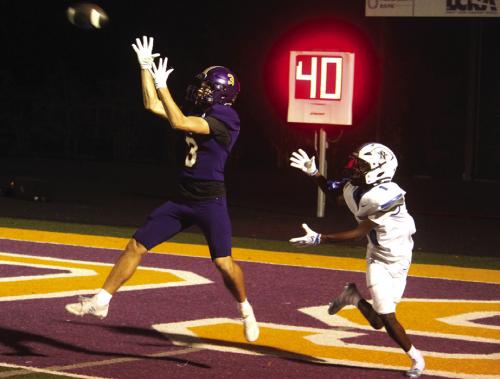 La Grange’s Rogan Mihatsch makes an interception in front of Navasota receiver Caysien Douglas Friday in the endzone. Photo by Jeff Wick