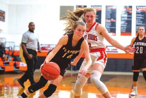 Carly Bonds works around Schulenburg’s Erica Otto to get to the goal. Photo by Stephanie Steinhauser
