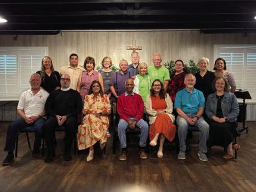 Pictured are (front row, from left) Bob Lee, Fr. Richard Barfield, Irma Rerich, Dr. Michael Fonseca, Stacy Oeding, Deacon Dwain Dungen, Bethany Muzny, (back) Brianne Bernsen, Andre Muniz, Diane Holub, Mary Beth Koenig, Ernie Lozano, David Rohan, Elizabeth Wenke, Russell Wenke, Amanda Brown, Kathi Mickan and Ana Ahrendt.