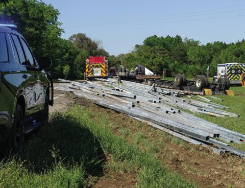 An 18-wheeler lost a load of square tubing in a rollover in Round Top Monday. Photo by Andy Behlen