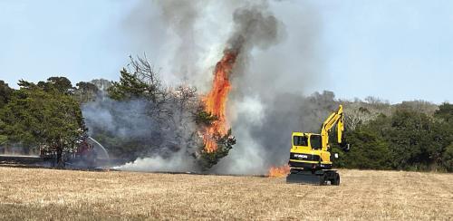 Firefighters and landowners spent about two hours battling Friday’s fire. Photo courtesy of Craig Moreau