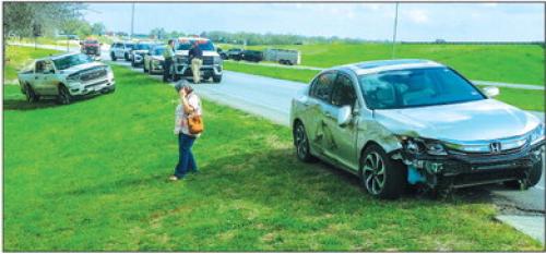 Two drivers escaped injury but their vehicles had to be towed after a wreck at the dangerous intersection of SH 159 and SH 71 Bypass in La Grange on Monday. Photo by Andy Behlen