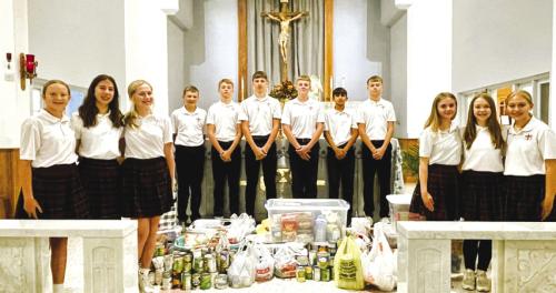 The annual St. Rose of Lima Catholic School Thanksgiving Mass was held on Thursday, Nov. 21. Each class prepared a basket for the Family Crisis Center that contained a complete Thanksgiving meal. These baskets were displayed at the altar during the Mass. Additionally the student body collected 364 lbs. of non perishable food for the Schulenburg Area Food Pantry.