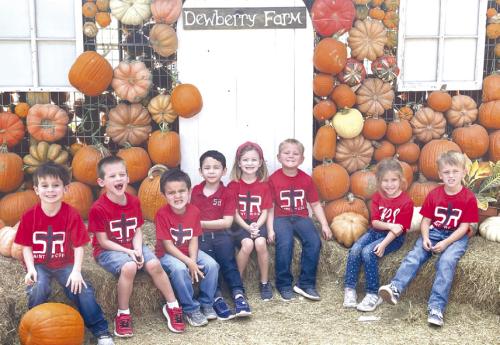 St. Rose of Lima Catholic School Kindergarteners had a great day at the Dewberry Farm in Brookshire. Students were able to experience farm animals, Fort DewHickey, Pedal Carts, Pumpkin Hollar, Slide Mountain, Jumping Pillows, Train Rides, Hay Mountain, and also received a pumpkin. The whole class enjoyed the farm-like atmosphere. Pictured from left are Sawyer Tindall, Luke Shimek, Sebastian Saucedo, Ryker Demel, Harper Wright, Myles Krenek, Penelope Machac and Deacon Heinrich.
