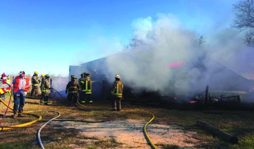 A barn on property along US 77 north of Schulenburg burned Friday. Photo by Schulenburg Volunteer Fire Department.