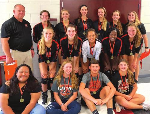 The members of the Schulenburg volleyball team pose after winning the Silver Bracket title at their home tourney Saturday.