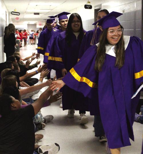 Grads Walk Their Old Halls