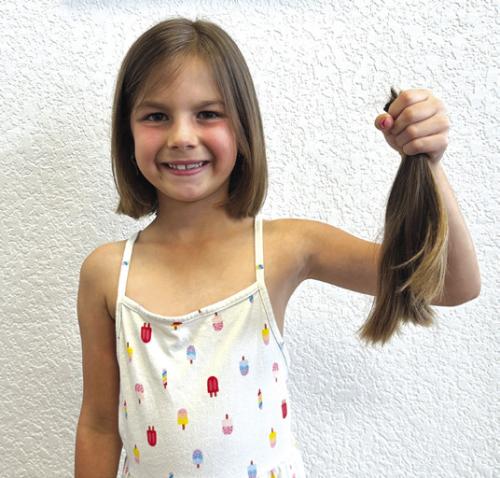 Bailey Tousek Donates Hair