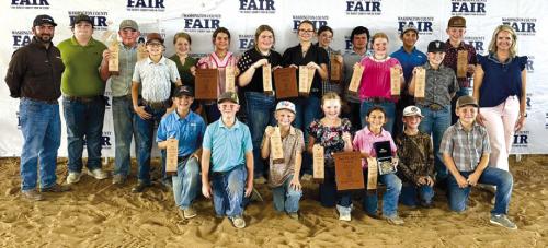 Pictured front from left kneeling: Crockett Guenther, Jehnsen Janecka, Joe Carrales, Abigale McBride, Emma Zwescpher, Rowdy Guenther, and Parker Gabler; back row: Coach JoJo Carrales, Rilan Karisch, Abraham McBride, Tate Fritsch, Hayleigh Pizzitola, Adalyn Carrales, Rheagan Karisch, Tatum Fritsch, Laramie Laake, Logan Poncik. Kaisley Janecka, Dylan Zweschper, Hudson Holub, Holden Holub, and Coach Kaci Carrales.