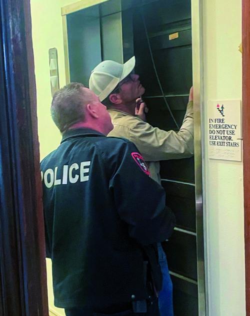 Couple Stuck in Courthouse Elevator