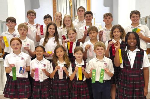 District Winners front, from left: Rowan Heinrich, Emma Zweschper, Margot Machac, Harper Wright, Benjamin Sustr, Ava Boston; second row: Sebastian Lincoln, Brielle Goedrich, Emileigh Divin, Kasen Zbranek, Lane Schiffli; back row: Luke Goedrich, Levi Johnson, Micah Garcia, Cate Hooper, Briley Hartensteiner, Kaleb Zapalac, Cal Schiffli, Jack Schiffli, and Noah Heger.