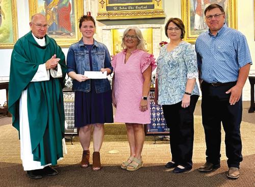 St. John the Baptist Catholic Church, Fayetteville, dedicated a percentage of this year’s annual feast proceeds to Hospice Brazos Valley. A check in the amount of $9,000 was presented by Father Steve Sauser at the Sunday morning Mass. Receiving the check for Hospice Brazos Valley were nurses, Liz Jones and Kelly Muzny. Pictured are Father Steve, Liz Jones, Kelly Muzny and Feast Chairs, Jean Muske and John Spiess.