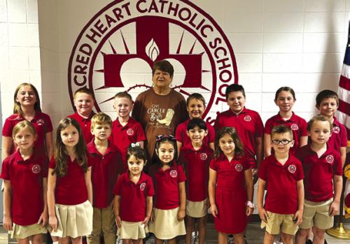 Coins for a Cure: Sacred Heart School students donated $512.44 to Relay for Life of Fayette County.