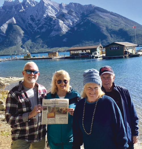 The Fayette County Record traveled to the Canadian Rockies with, from left, Fayetteville residents Patrick and Beth Mackey, along with Janet and Ed Murphy from La Grange. This photo was taken at Lake Minnewanka.