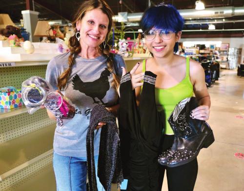 Dawn Sedlar and her daughter, Camryn, had an “80s Nite” party to attend and they needed outfits. So they came to Second Chance Emporium in La Grange. Of course. The non-profit is open 9 a.m.-3 p.m. every Friday and Saturday and is filled with items from most every decade. Photo by Bill Bishop
